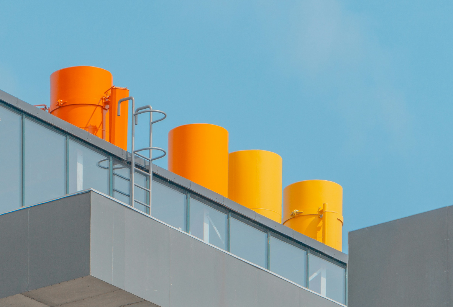Industrial building with bright yellow rooftop equipment